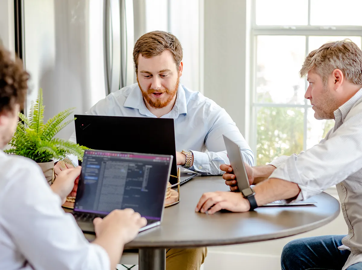 Local Atticus, Jonathan Guider and Matt Braman engaged in a Versoft Consulting meeting
