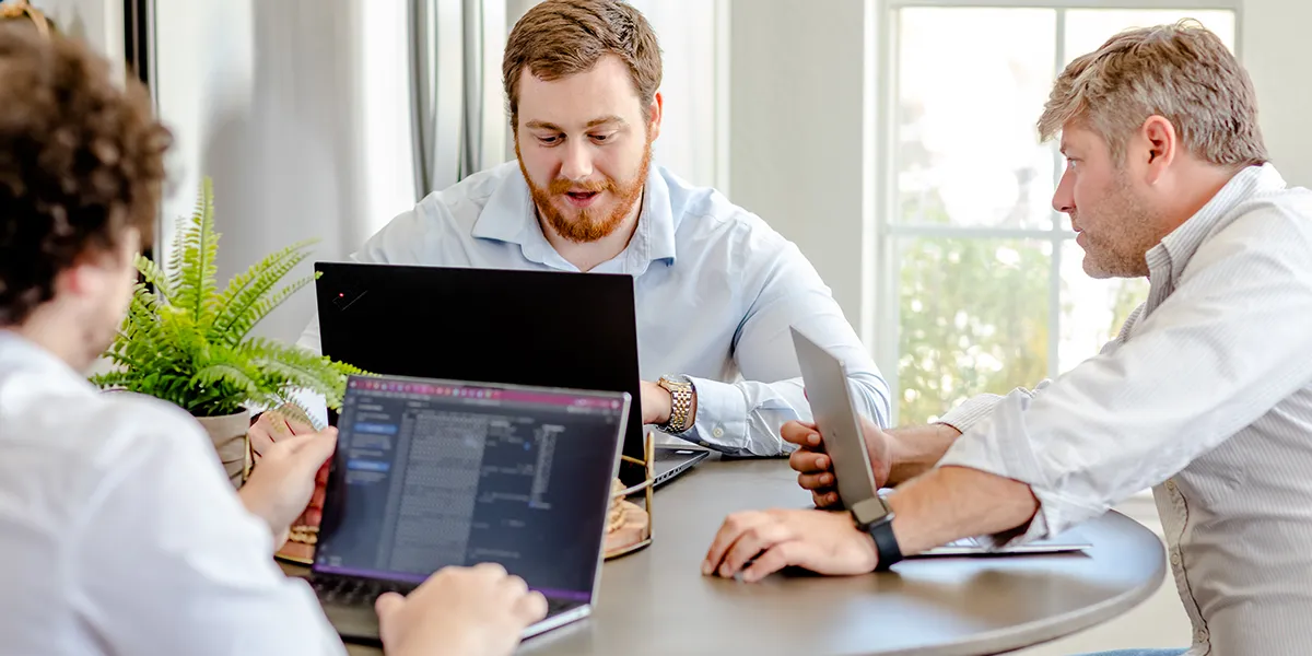 Local Atticus, Jonathan Guider and Matt Braman engaged in a Versoft Consulting meeting